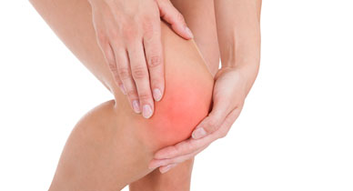 Person holding knee
