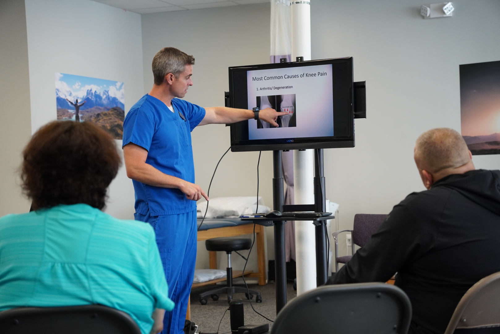 Physical therapist presenting to patients during a workshop at Panetta Physical Therapy in Bay Shore